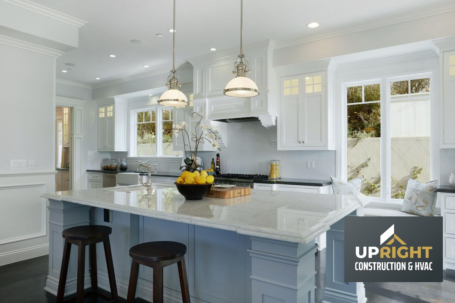 Remodeled Los Angeles kitchen with custom cabinets, pendant lighting, and quartz countertops